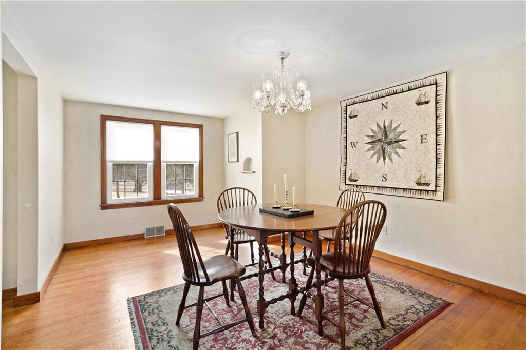 2490 Home Street Indiana, PA 15701 - Photo 4 of 22 a view of a dining room with furniture wooden floor and a chandelier