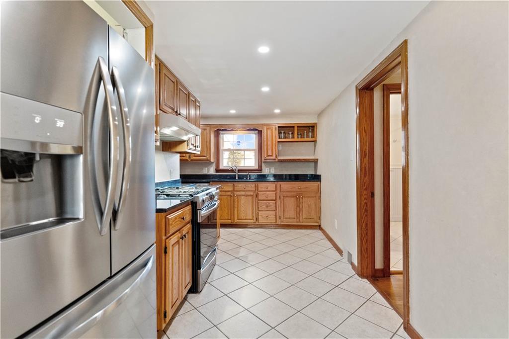 2490 Home Street Indiana, PA 15701 - Photo 5 of 22 a kitchen with stainless steel appliances granite countertop a refrigerator and a sink