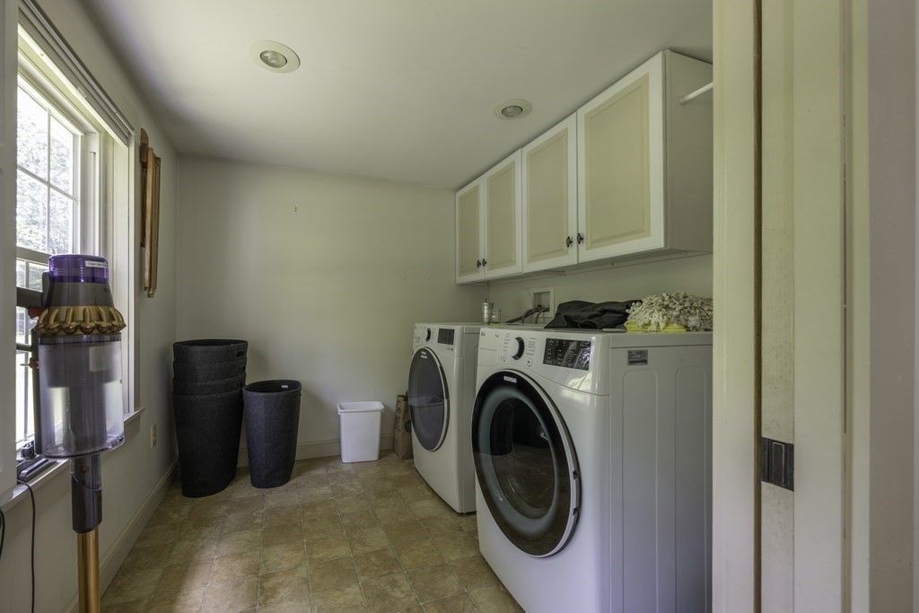 12 West Gill Road Gill, MA 01354 - Photo 15 of 42 a storage room with washer and dryer