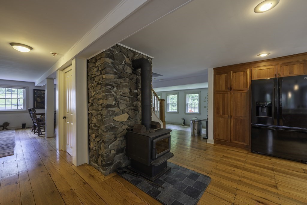 12 West Gill Road Gill, MA 01354 - Photo 20 of 42 a view of a livingroom with wooden floor and furniture