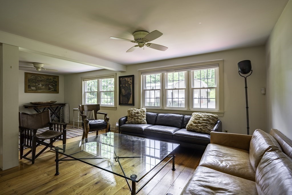 12 West Gill Road Gill, MA 01354 - Photo 22 of 42 a living room with furniture and a large window