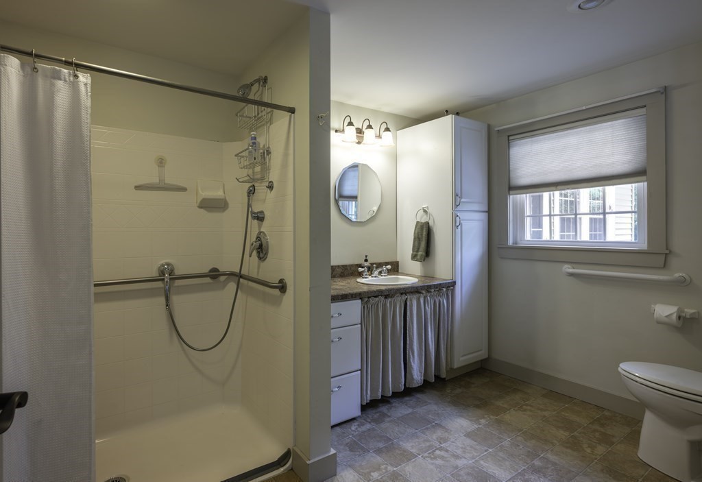 12 West Gill Road Gill, MA 01354 - Photo 24 of 42 a bathroom with a granite countertop sink a toilet and shower
