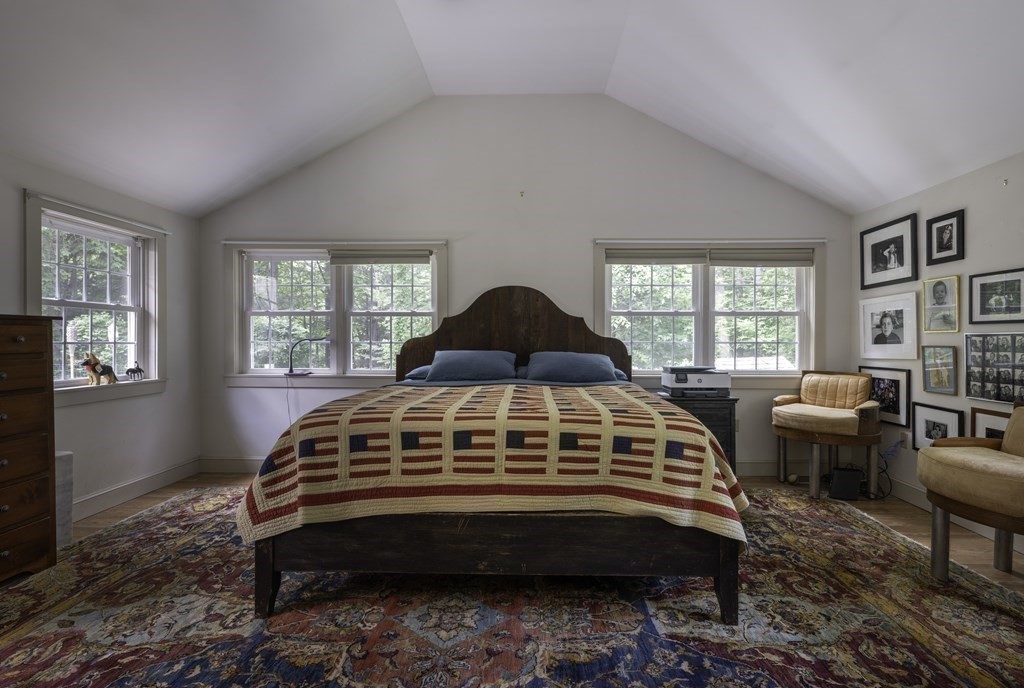 12 West Gill Road Gill, MA 01354 - Photo 29 of 42 a bedroom with a bed window and table