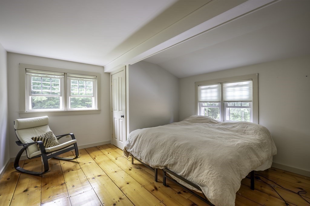 12 West Gill Road Gill, MA 01354 - Photo 30 of 42 a bedroom with a bed and a window