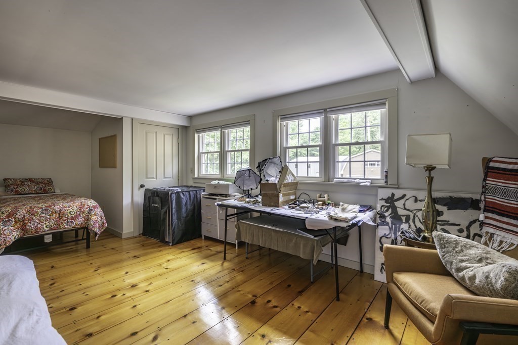 12 West Gill Road Gill, MA 01354 - Photo 31 of 42 a living room with furniture and a window