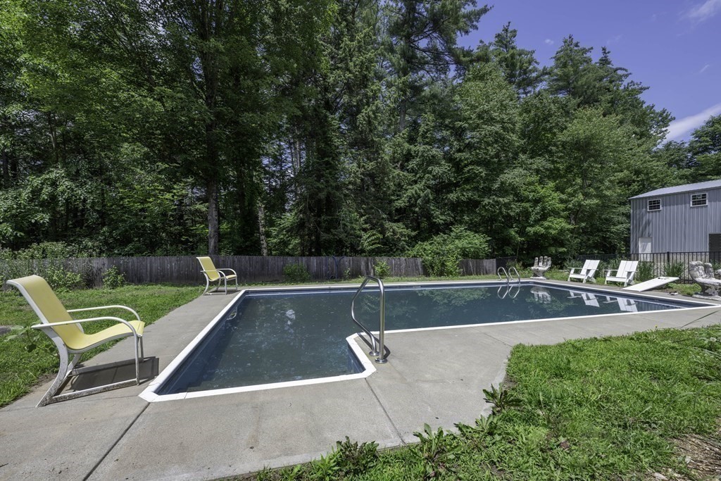 12 West Gill Road Gill, MA 01354 - Photo 4 of 42 a view of a swimming pool with a patio