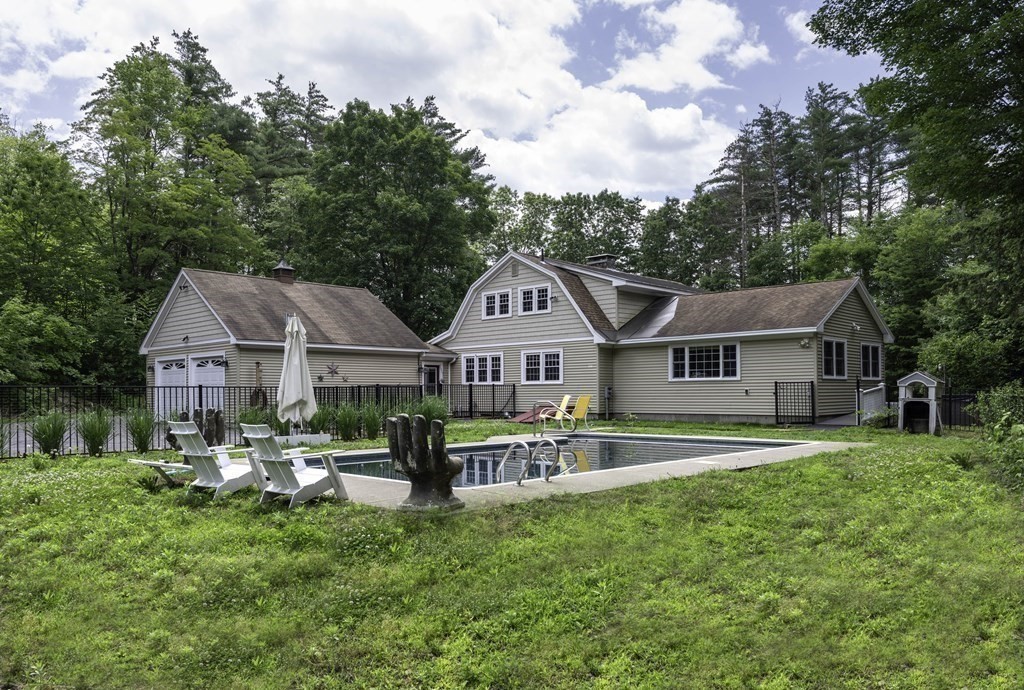12 West Gill Road Gill, MA 01354 - Photo 5 of 42 a view of a house with a big yard and large trees