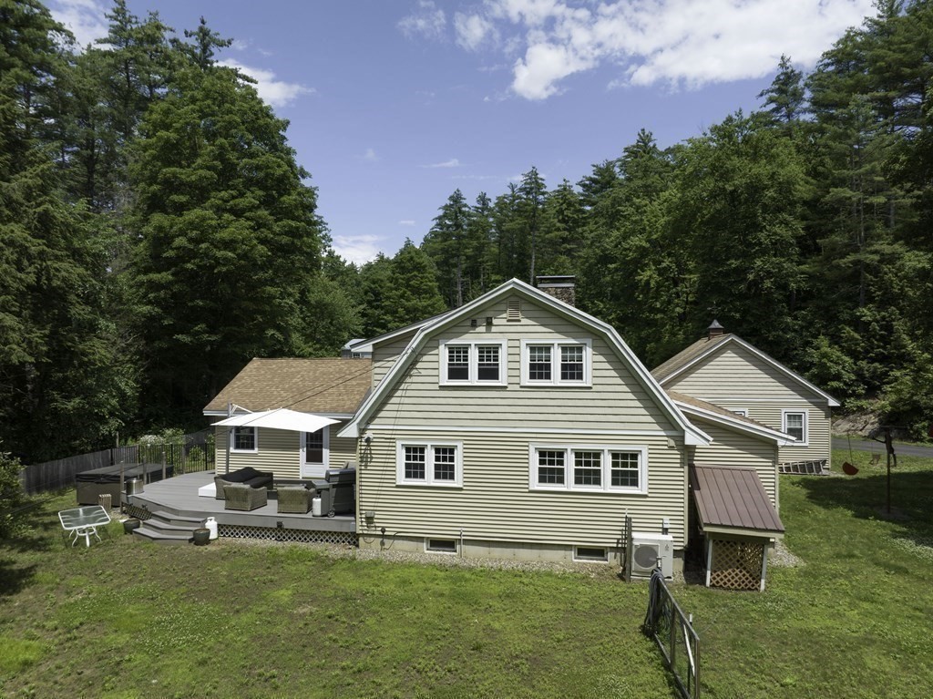 12 West Gill Road Gill, MA 01354 - Photo 7 of 42 a front view of a house with garden