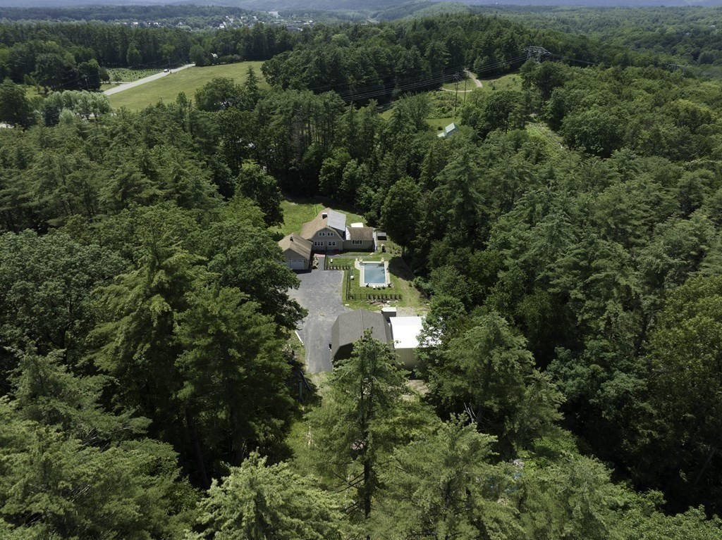 12 West Gill Road Gill, MA 01354 - Photo 9 of 42 an aerial view of a house with a yard
