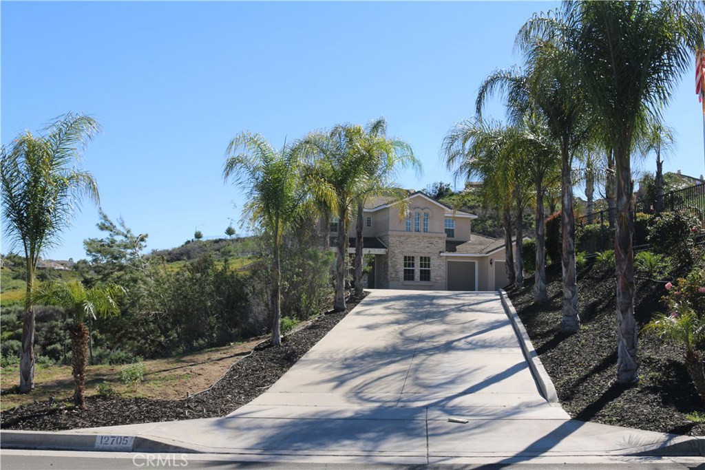 12705 Canyonwind Road Riverside, CA 92503 - Photo 1 of 1 a view of a house with a yard