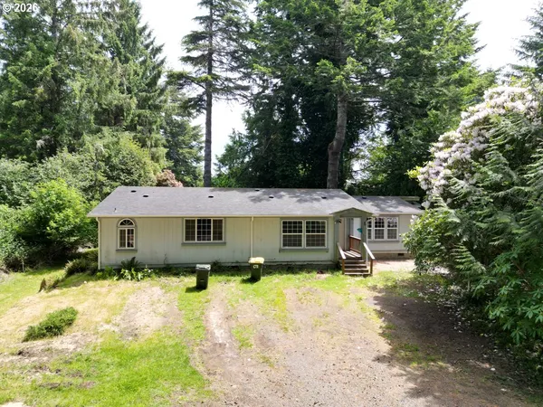 a house that has tree in front of it