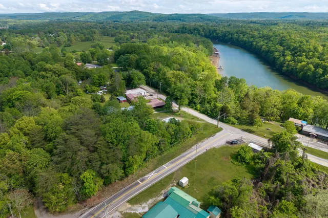 a view of a garden with a lake view