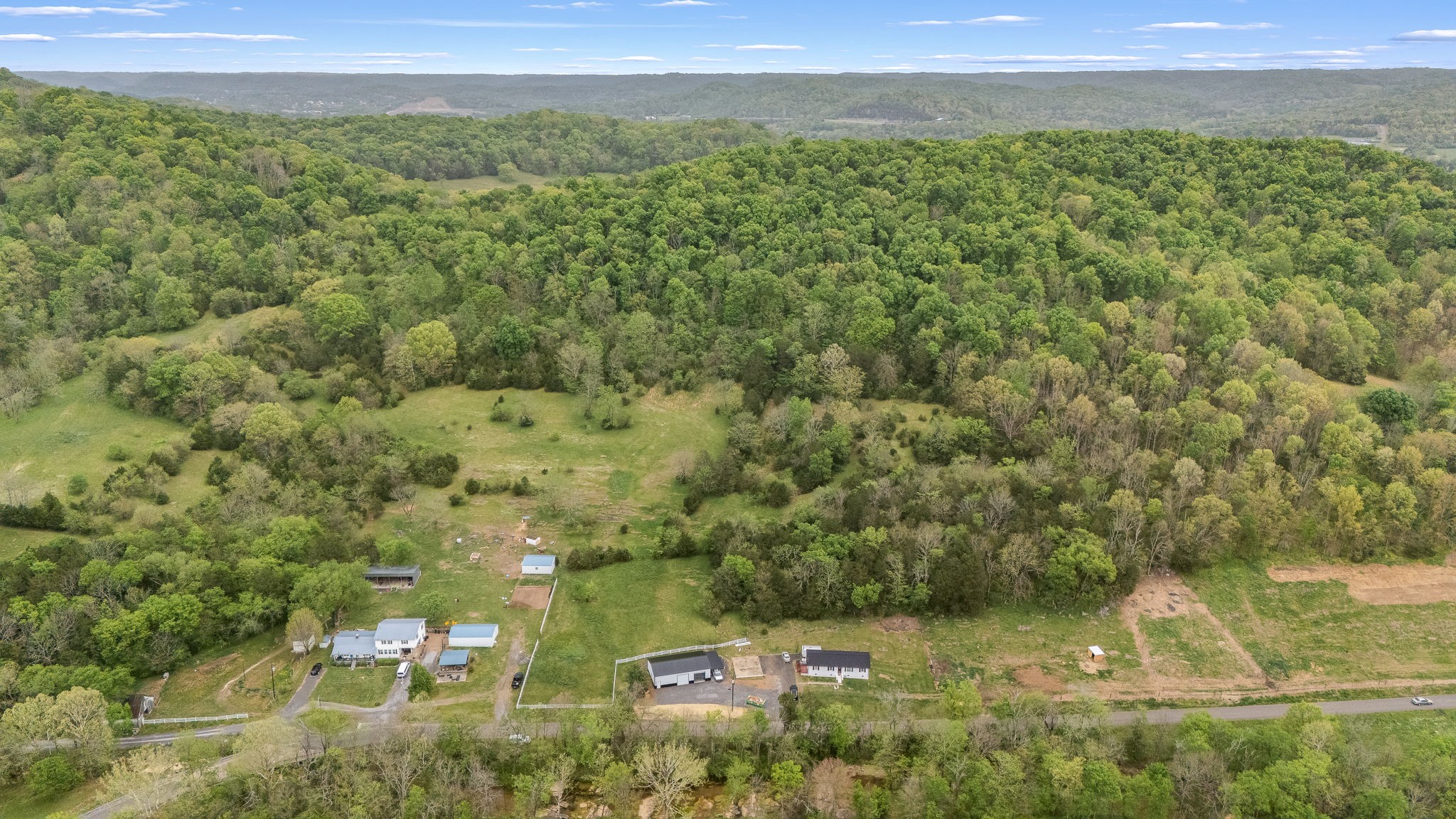 1036 Locke Creek Road Readyville, TN 37149 - Photo 3 of 18 a view of a lush green field