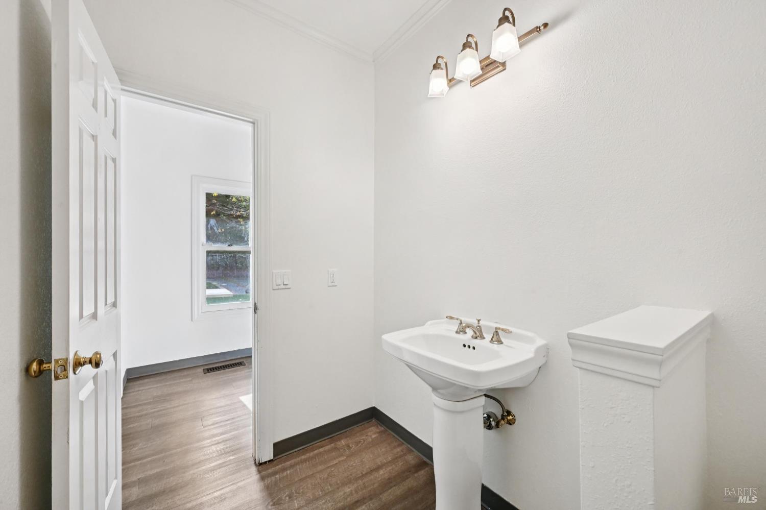 5 Maoli Drive San Rafael, CA 94903 - Photo 17 of 74 a bathroom with a sink a mirror and a shower