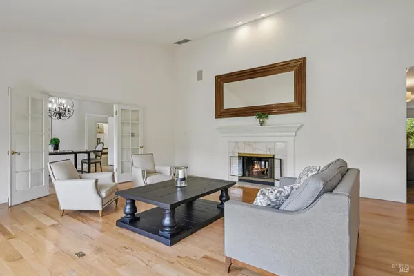 a spacious bedroom with a bed and a table