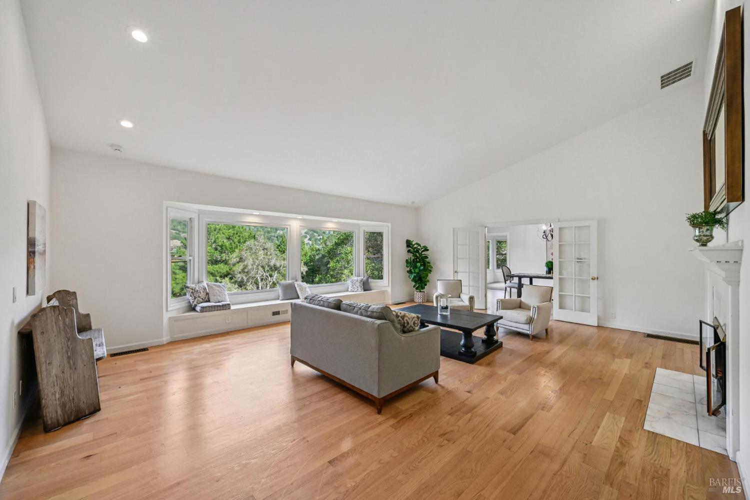 5 Maoli Drive San Rafael, CA 94903 - Photo 32 of 74 a living room with furniture and a large window
