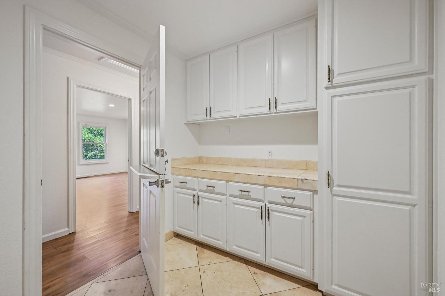 5 Maoli Drive San Rafael, CA 94903 - Photo 39 of 74 a view of a kitchen with white cabinets