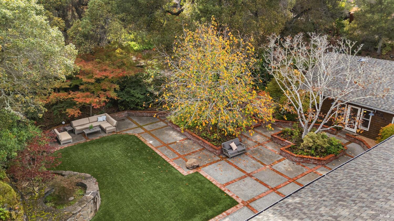 5 Maoli Drive San Rafael, CA 94903 - Photo 51 of 74 a backyard of a house with lots of green space