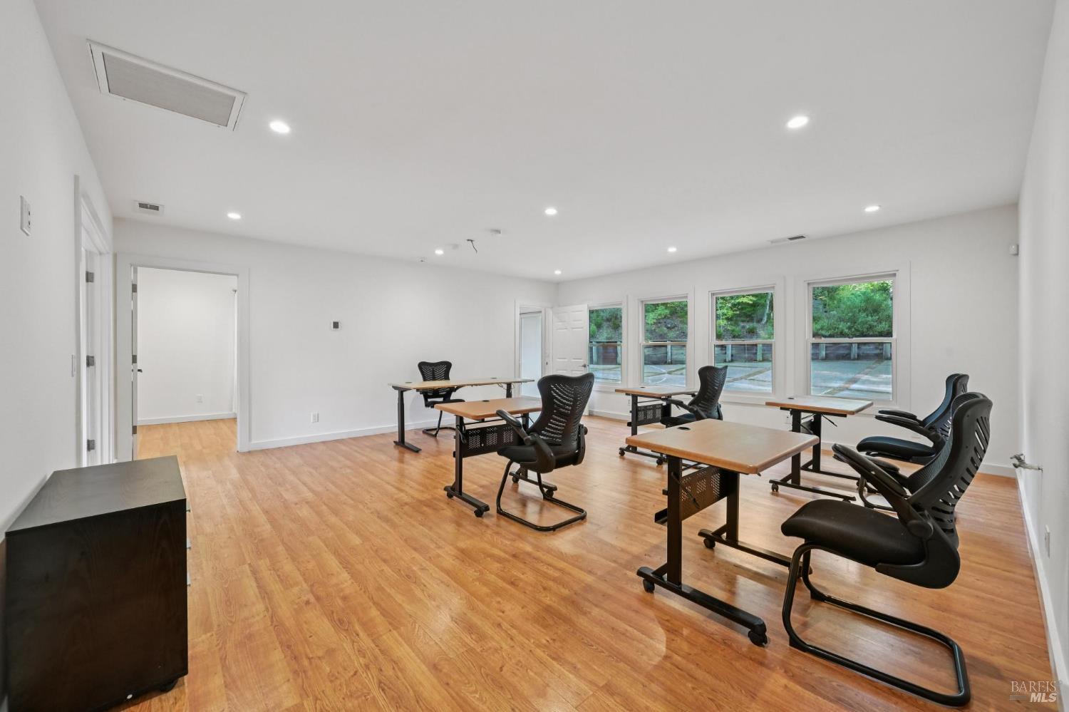 5 Maoli Drive San Rafael, CA 94903 - Photo 53 of 74 a living room with furniture and wooden floor