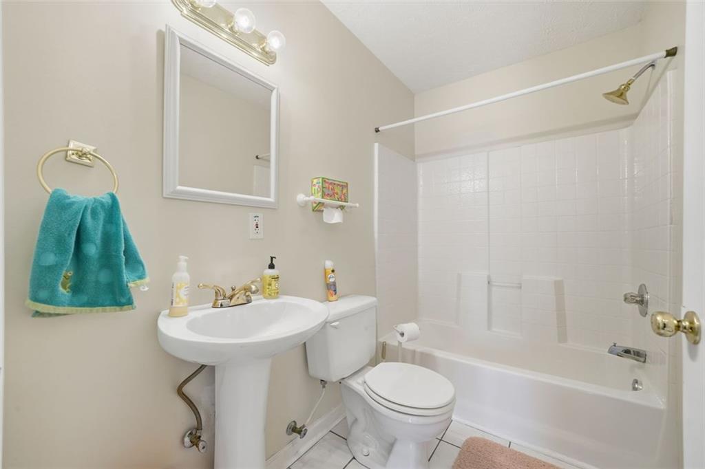 3170 Wages Circle Dacula, GA 30019 - Photo 20 of 39 a bathroom with a sink toilet and shower