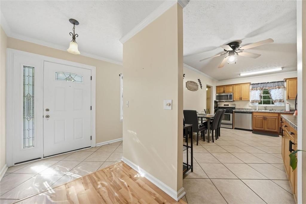 3170 Wages Circle Dacula, GA 30019 - Photo 2 of 39 a view of a livingroom with furniture and a window