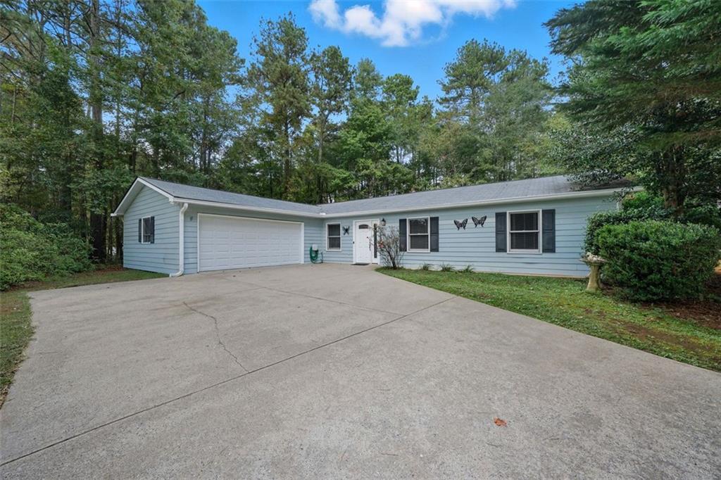 3170 Wages Circle Dacula, GA 30019 - Photo 26 of 39 front view of house with a yard and potted plants