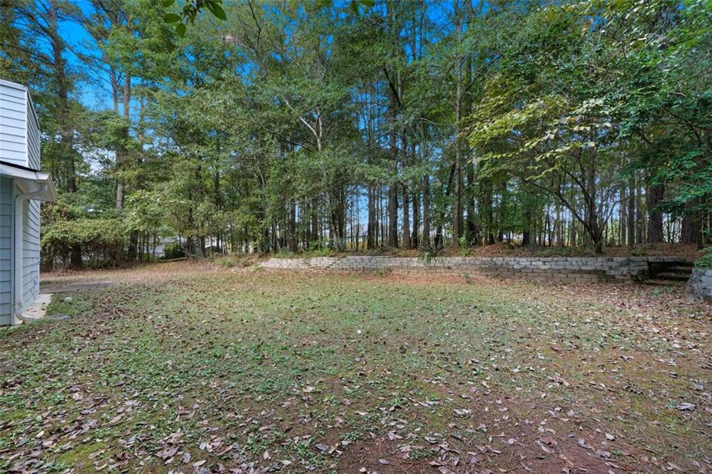 3170 Wages Circle Dacula, GA 30019 - Photo 29 of 39 a view of outdoor space with trees