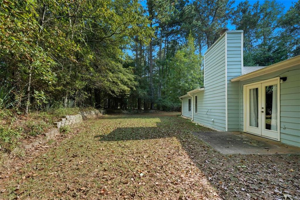 3170 Wages Circle Dacula, GA 30019 - Photo 33 of 39 a view of a house with a yard