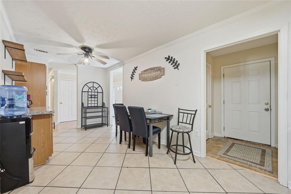 3170 Wages Circle Dacula, GA 30019 - Photo 6 of 39 a view of a dining room with furniture