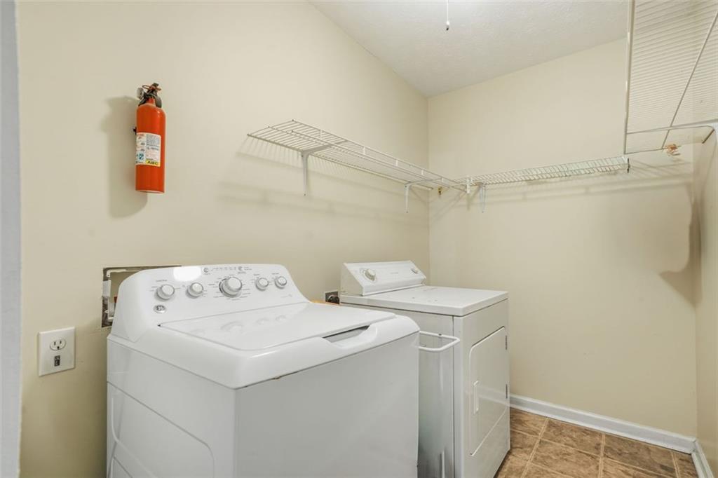 3170 Wages Circle Dacula, GA 30019 - Photo 9 of 39 a utility room with dryer and washer