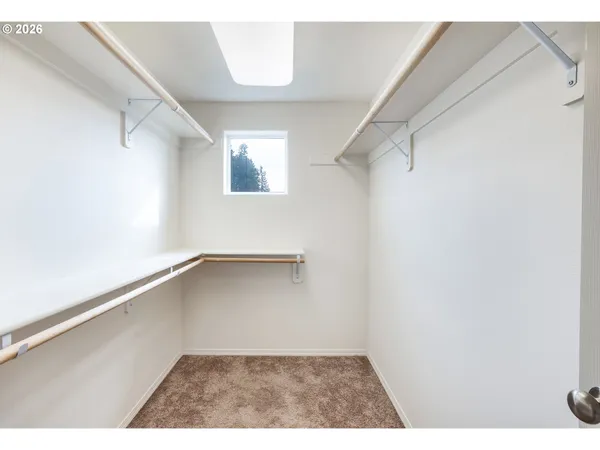 view of an empty room with a window