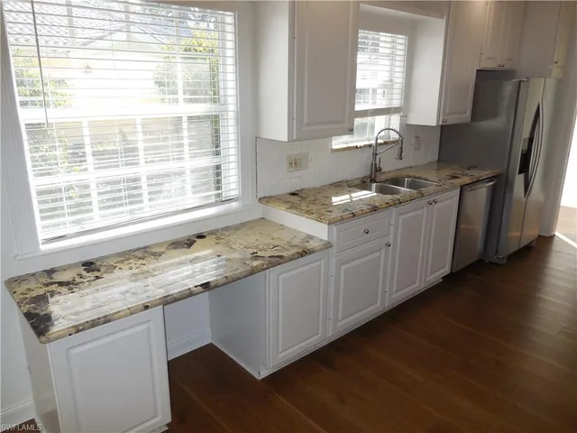 a group of people sitting at tables in a room