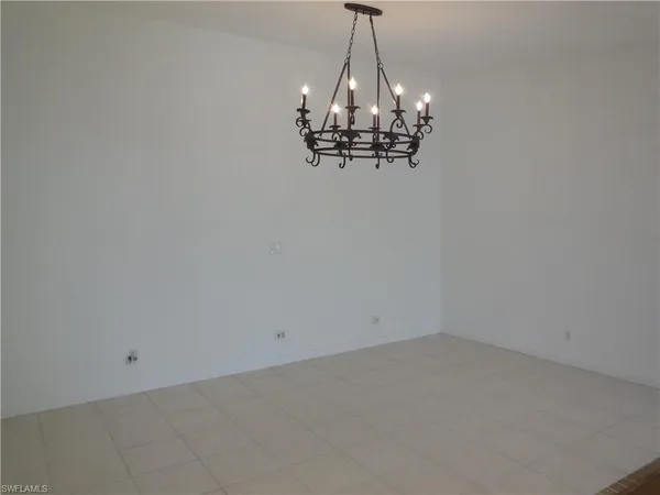 a very nice looking room with a chandelier