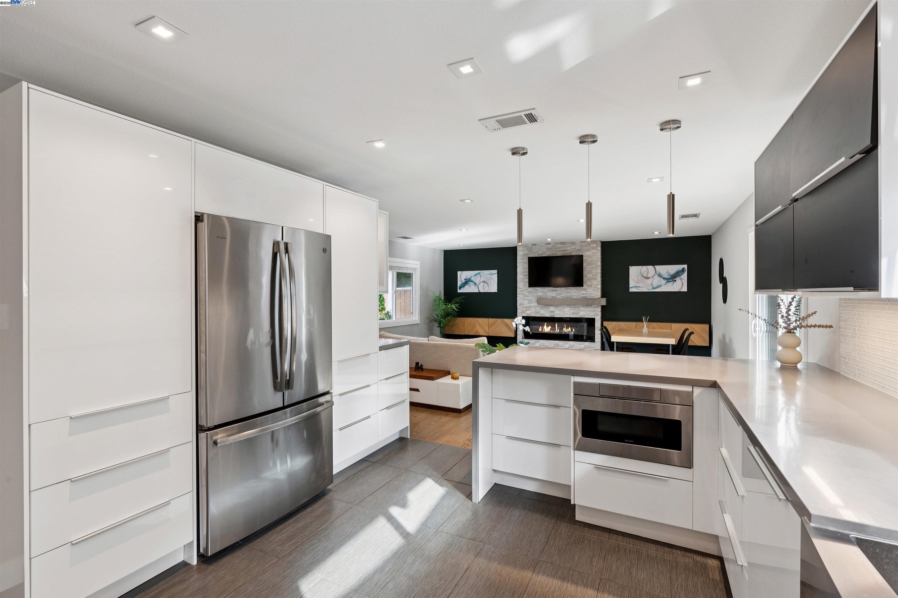1230 Hale Drive Concord, CA 94518 - Photo 21 of 60 a kitchen with stainless steel appliances a refrigerator sink and stove