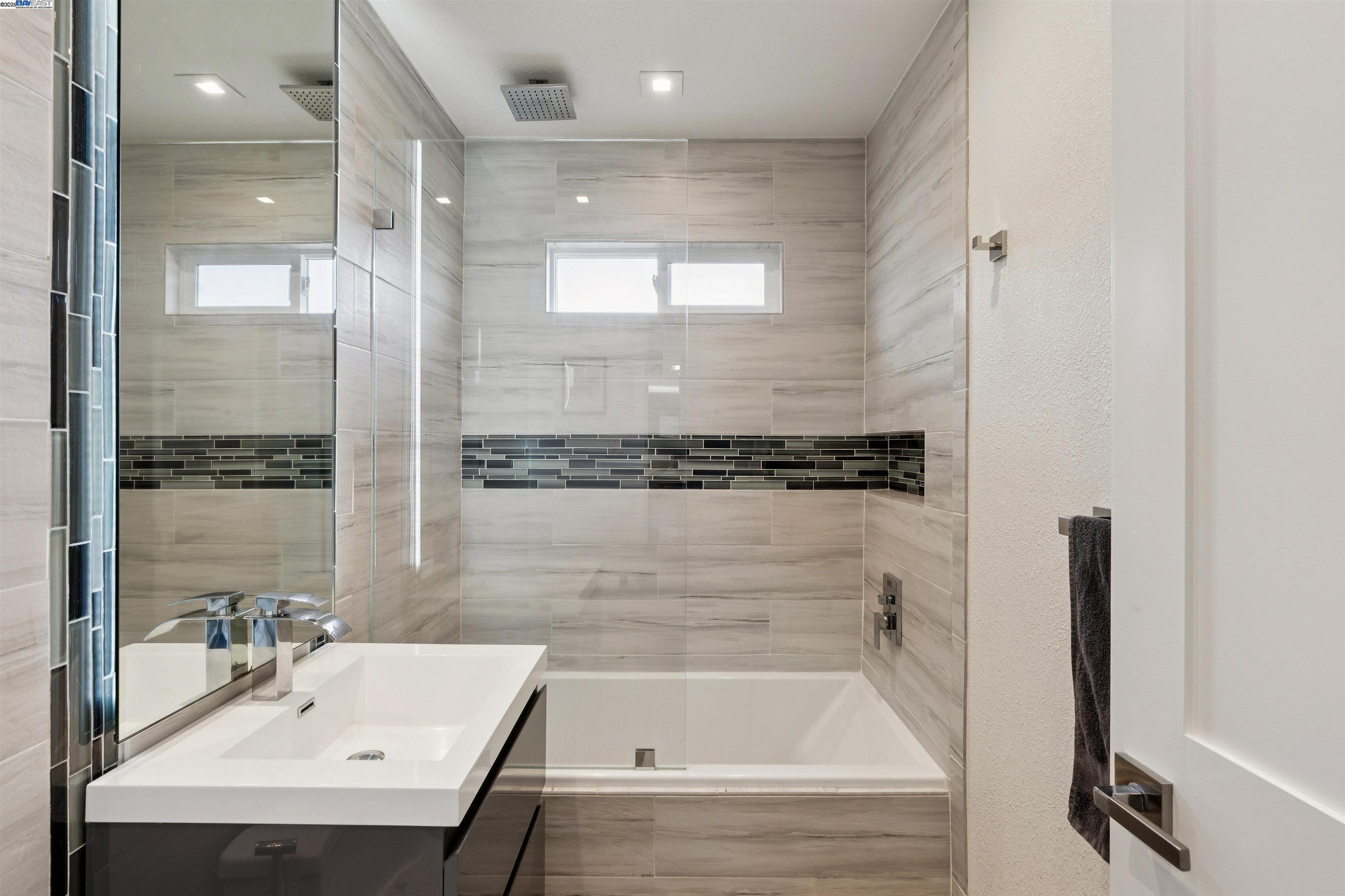 1230 Hale Drive Concord, CA 94518 - Photo 32 of 60 a bathroom with a bathtub and a sink