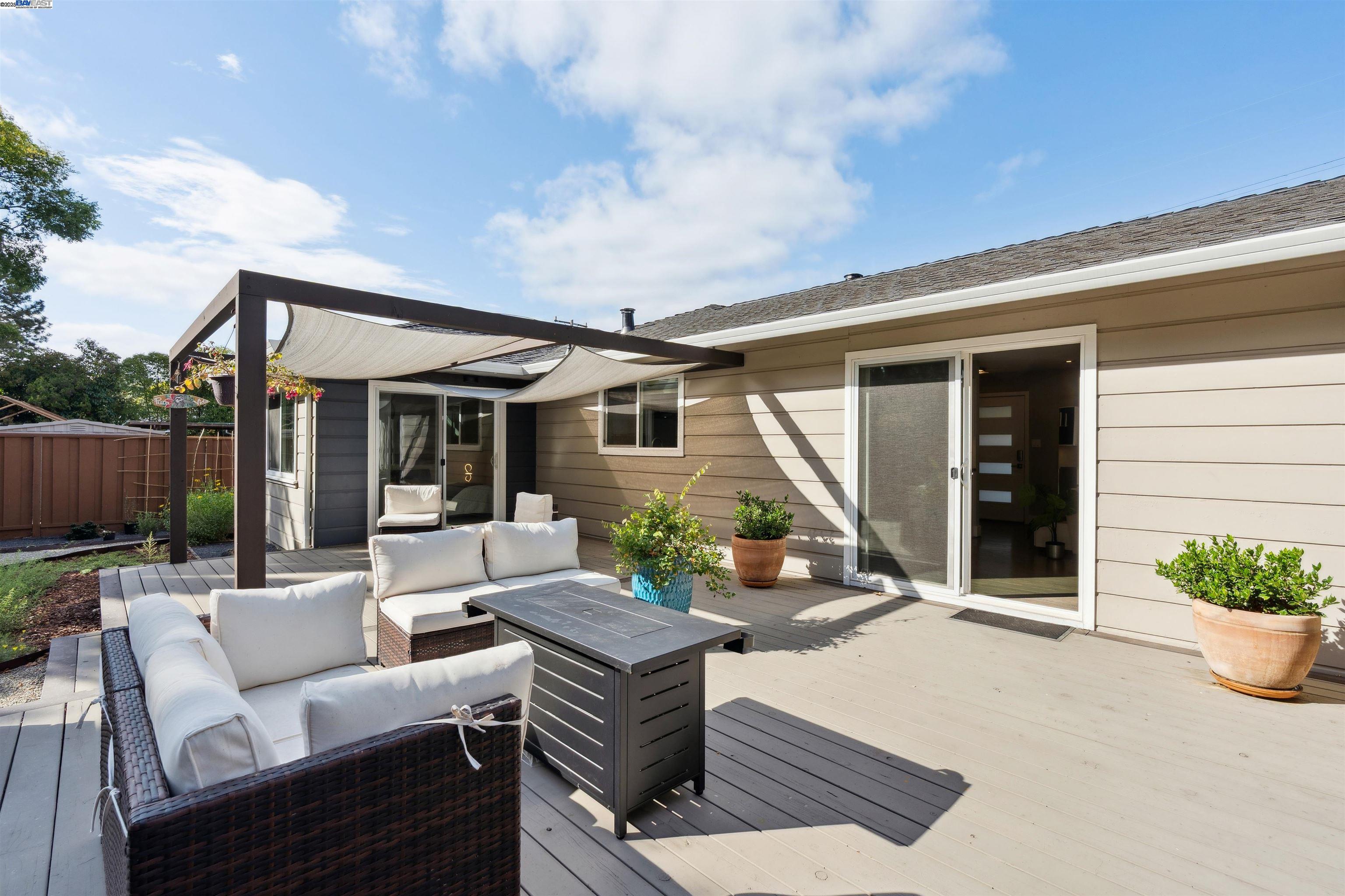 1230 Hale Drive Concord, CA 94518 - Photo 36 of 60 a view of a patio with couches table and chairs and potted plants