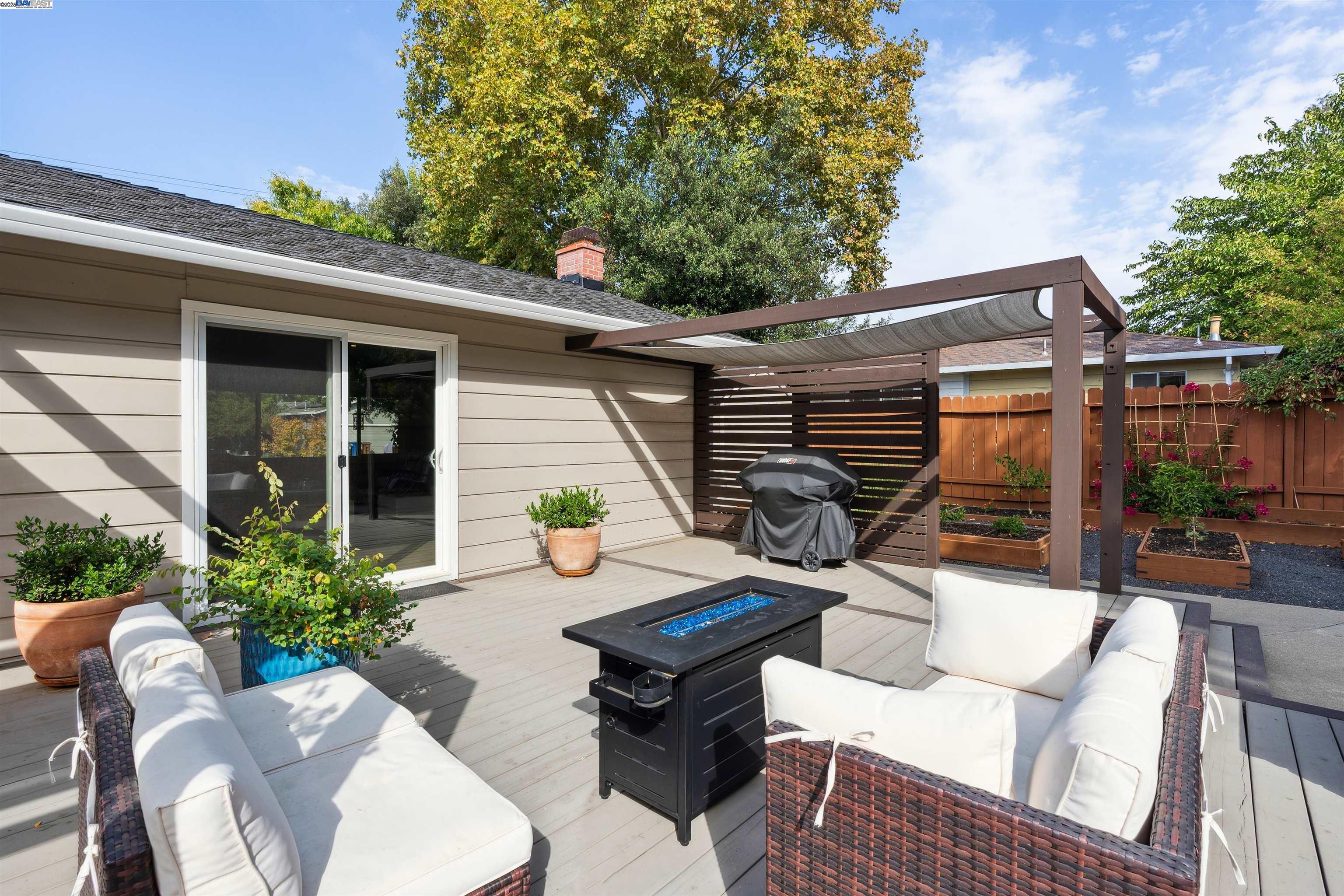 1230 Hale Drive Concord, CA 94518 - Photo 37 of 60 a view of a patio with couches table and chairs and potted plants