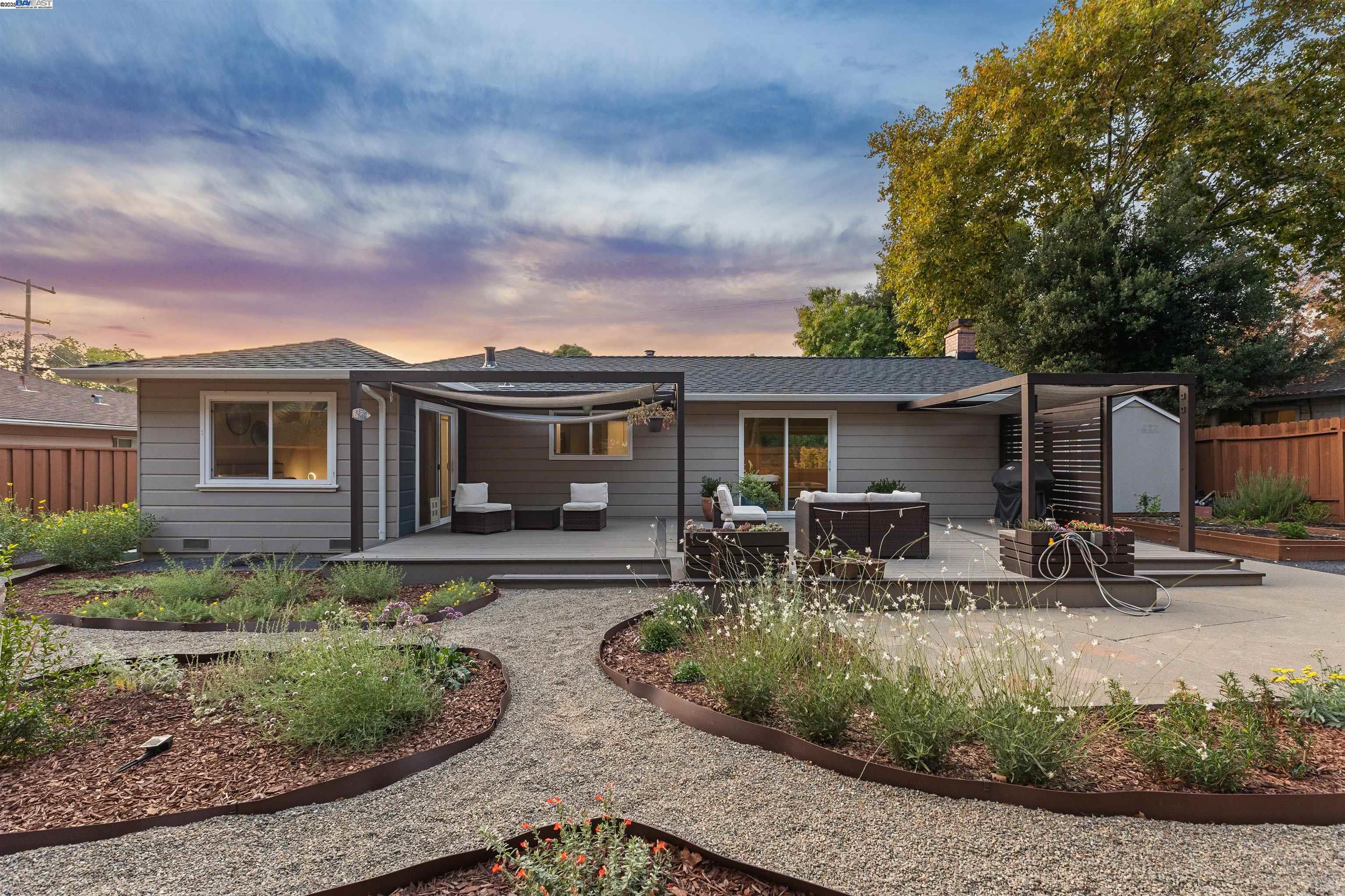 1230 Hale Drive Concord, CA 94518 - Photo 43 of 60 a view of a house with backyard sitting area and garden
