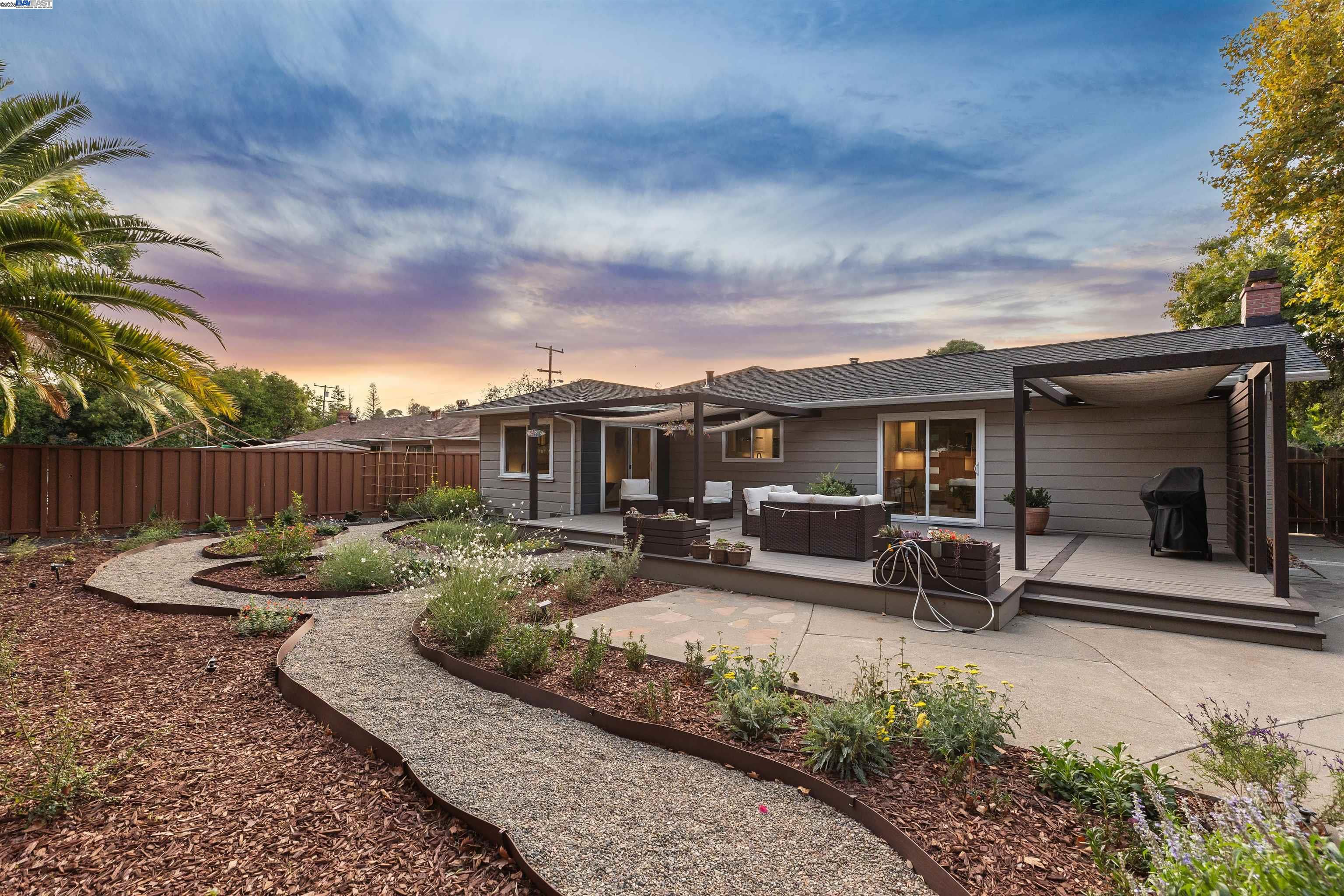 1230 Hale Drive Concord, CA 94518 - Photo 45 of 60 a view of a house with backyard sitting area and garden