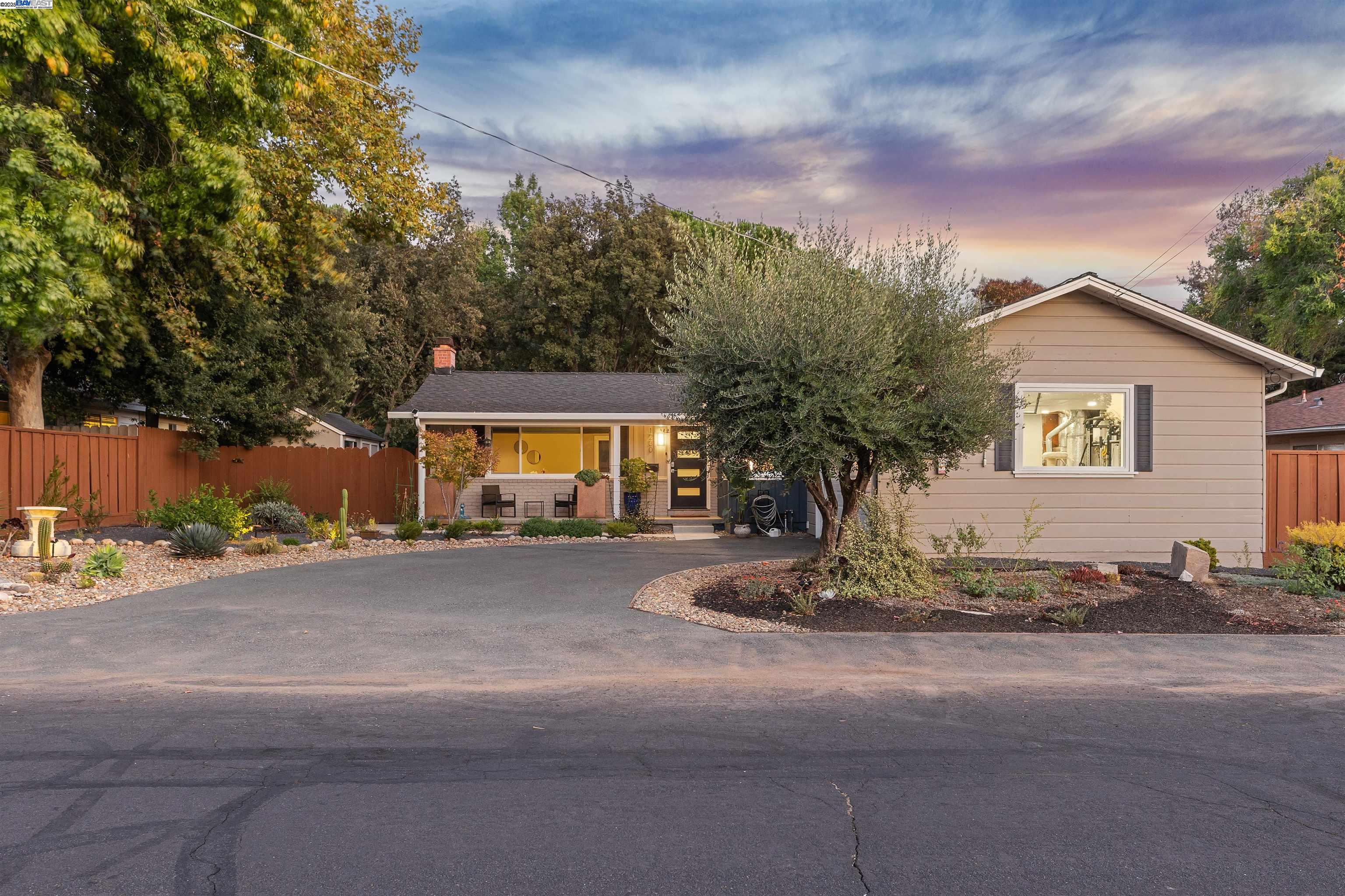 1230 Hale Drive Concord, CA 94518 - Photo 56 of 60 a front view of a house with a yard and garage