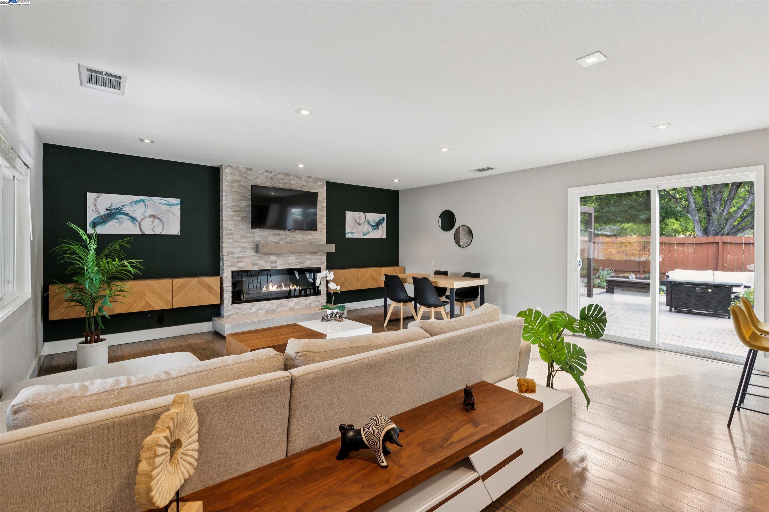 1230 Hale Drive Concord, CA 94518 - Photo 6 of 60 a living room with furniture fireplace and a large window