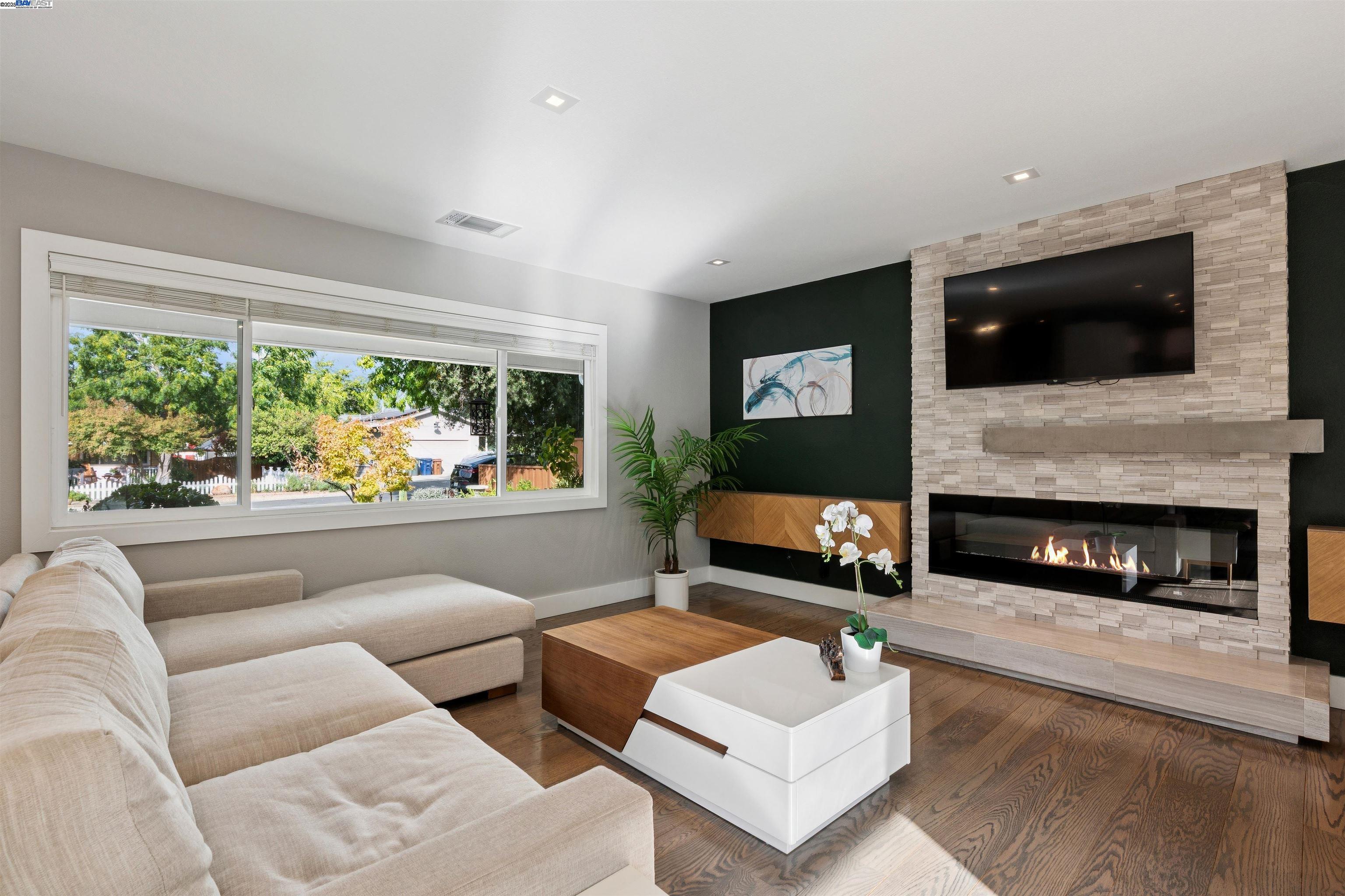 1230 Hale Drive Concord, CA 94518 - Photo 8 of 60 a living room with furniture fireplace and flat screen tv