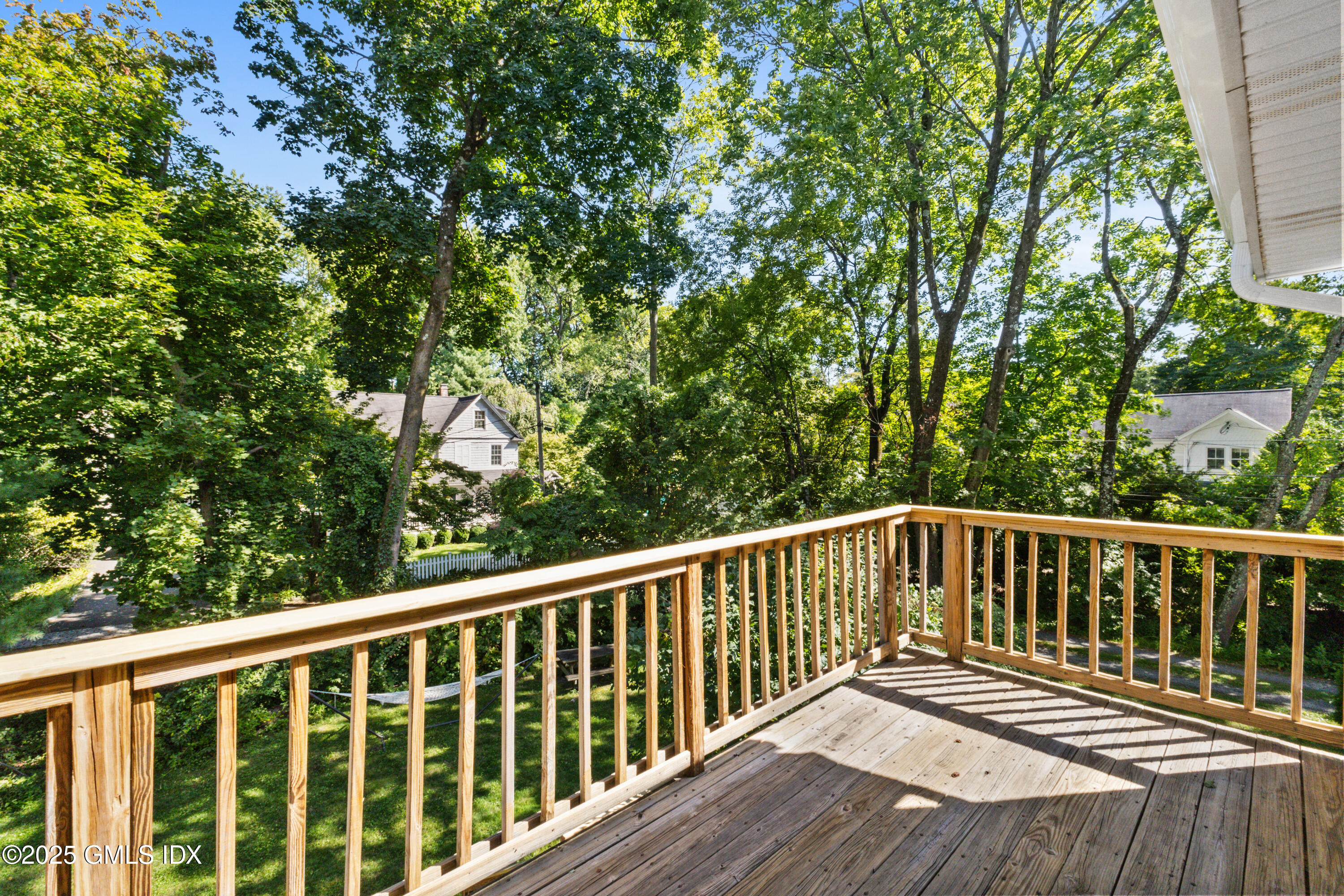 63 Riverside Avenue Riverside, CT 06878 - Photo 18 of 26 a view of balcony with wooden floor and fence