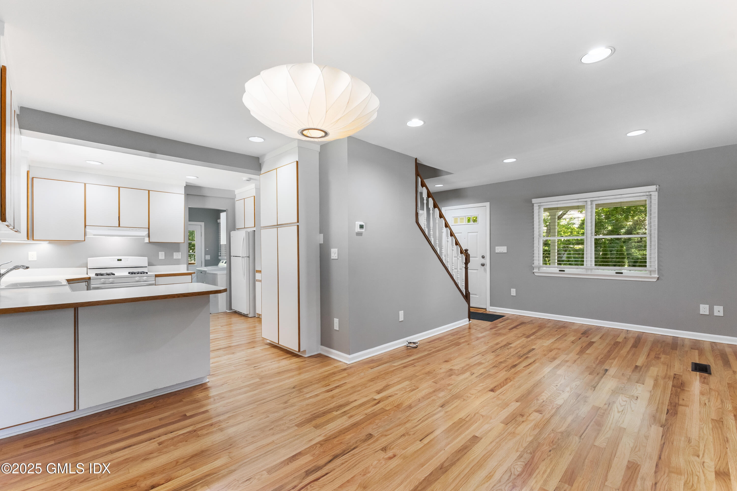 63 Riverside Avenue Riverside, CT 06878 - Photo 3 of 26 a view of a kitchen with a sink and a window
