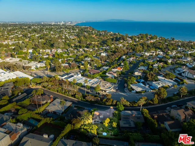 an aerial view of residential house with outdoor space