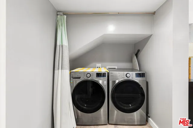 a view of a room with a white walls