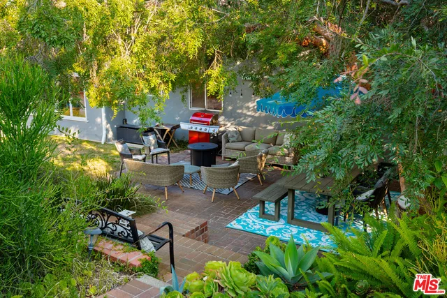a view of a chairs and table on the wooden floor