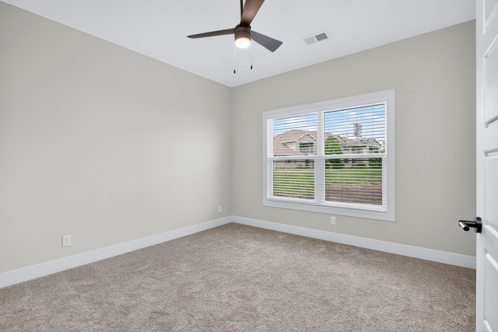 412 North 2nd Street Eldridge, IA 52748 - Photo 21 of 30 a view of an empty room with a window