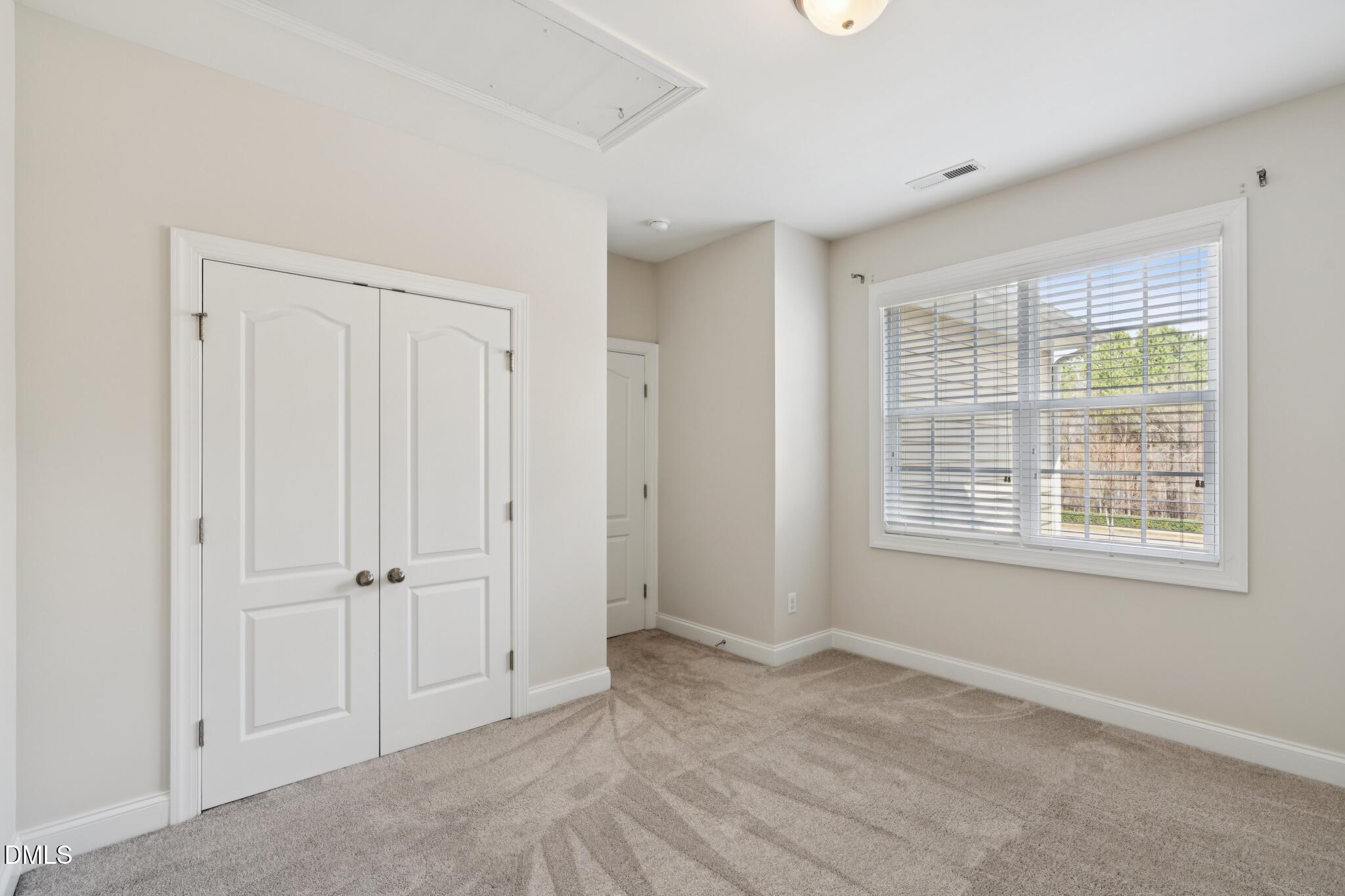 616 Democracy Street Raleigh, NC 27603 - Photo 42 of 61 an empty room with a window