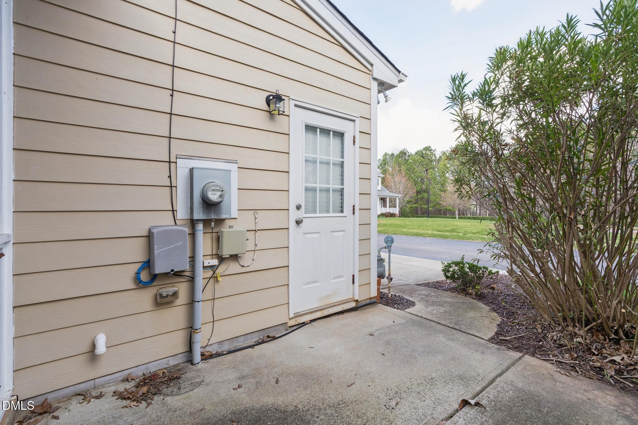 616 Democracy Street Raleigh, NC 27603 - Photo 58 of 61 a view of a house with backyard